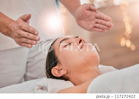 Woman, hands or relax reiki spa for stress management, headache relief or healthcare wellness in holistic clinic. Energy healer, man or mind chakra peace for sleeping patient and special effects glow Woman, hands or relax reiki spa for stress management, headache relief or healthcare wellness in holistic clinic. Energy healer, man or mind chakra peace for sleeping patient and special effects glow 117272422