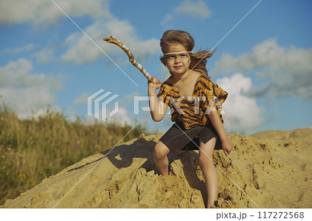 Cute baby dressed in the clothes of primitive people Cute baby dressed in the clothes of primitive people 117272568