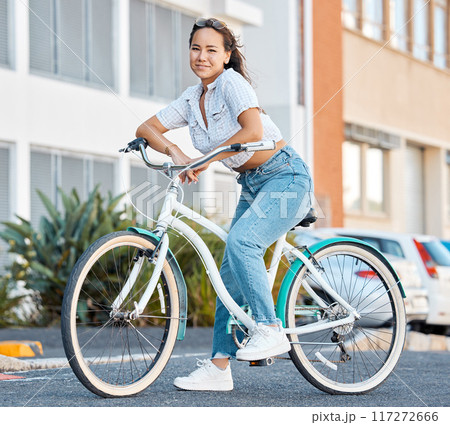 Bike, young woman and city portrait of student, gen z girl and influencer cycling in summer street for eco friendly carbon footprint. Happy asian female on vintage retro bicycle for urban adventure 117272666
