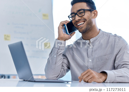 Comic businessman communication, talking and mobile call on a phone at a office computer. Phone call of laughing, happy and funny working corporate business man worker with a smile on a work break Comic businessman communication, talking and mobile call on a phone at a office computer. Phone call of laughing, happy and funny working corporate business man worker with a smile on a work break 117273011