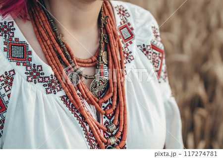 Woman Wearing Traditional Antique Jewelry Necklace. National Costume Of Ukraine 117274781