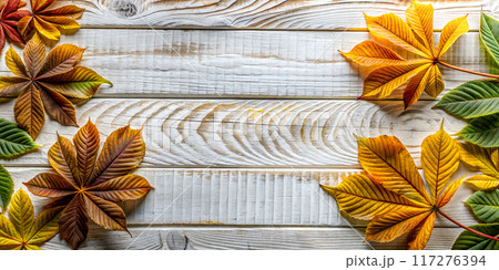 Autumn Background with Chestnut Leaves on White Wood. Top view 117276394