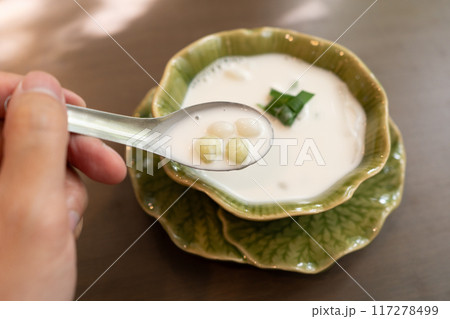 Bua Loy is a traditional Thai dessert made of glutinous rice flour balls in coconut milk. The soft, chewy balls are usually colorful, and sometimes filled with sweet fillings. Served warm Bua Loy is a traditional Thai dessert made of glutinous rice flour balls in coconut milk. The soft, chewy balls are usually colorful, and sometimes filled with sweet fillings. Served warm 117278499