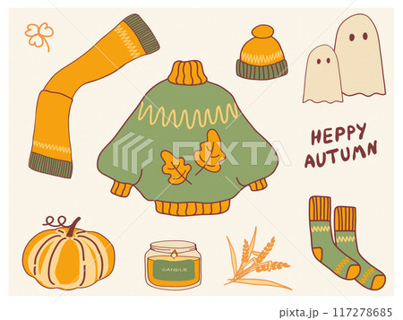 An artistic representation of autumn elements, showcasing a sweater, hat, ghost decorations, pumpkin, and fragrant candle. 117278685