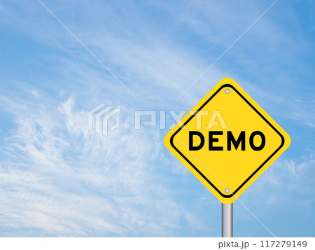 Yellow transportation sign with word demo on blue color sky background Yellow transportation sign with word demo on blue color sky background 117279149