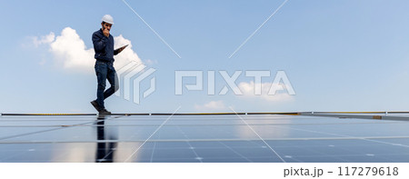 Engineer service check installation solar cell on the roof of factory 117279618