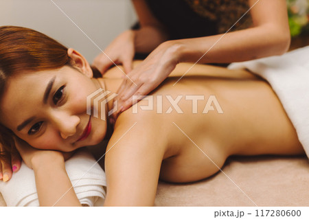 Relaxing with hand massage at beauty spa Relaxing with hand massage at beauty spa 117280600