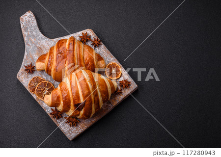 Delicious crispy sweet croissant cornet with chocolate Delicious crispy sweet croissant cornet with chocolate 117280943