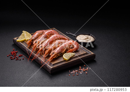 Tiger shrimp or langoustine boiled with spices and salt 117280953