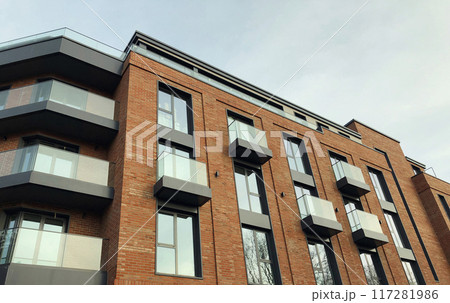 Architecture, real estate, residential apartment building with panoramic windows, modern complex Architecture, real estate, residential apartment building with panoramic windows, modern complex 117281986