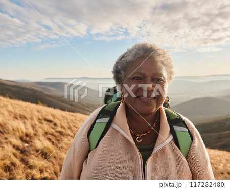 Happy Solo Female Hiker on Mountain Trail: One Woman Smiling 117282480