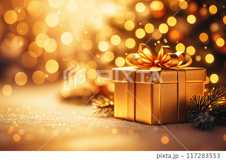 Golden gift box with bow on festive background. 117283553