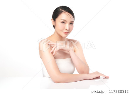 Beautiful young asian woman with clean fresh skin on white background, Face care, Facial treatment, Cosmetology, beauty and spa, Asian women portrait. Beautiful young asian woman with clean fresh skin on white background, Face care, Facial treatment, Cosmetology, beauty and spa, Asian women portrait. 117288512