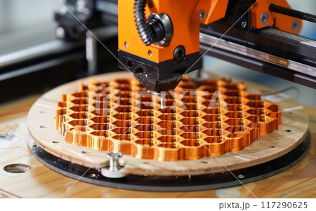 A 3D printer precisely extrudes molten material to create a grid of complex components. The image illustrates the printer's capability to mass-produce detailed parts. 117290625