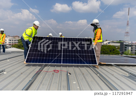 Technician worker on solar panels 117291947