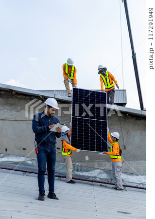 Technician worker on solar panels 117291949