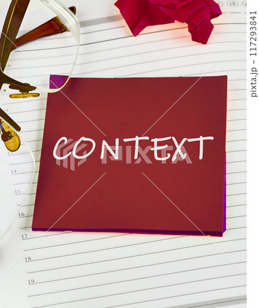 Content. Business and content and context concept. Text CONTEXT on a red sticker on the background of a sheet in a ruler Content. Business and content and context concept. Text CONTEXT on a red sticker on the background of a sheet in a ruler 117293841