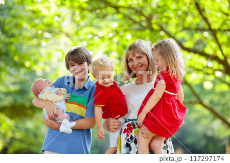 Portrait of happy woman with kids 117297174