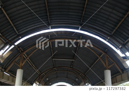 Dark under curve roof. 117297382