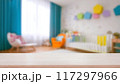 Empty wooden table with blurry baby room background, for design and decoration concepts 117297966
