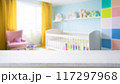 Empty wooden table with blurry baby room background, for design and decoration concepts 117297968