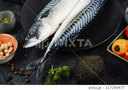 Uncooked mackerel fish with ingredients. Uncooked mackerel fish with ingredients. 117299477