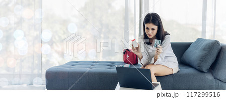 Woman sit down on sofa. healthcare virus protection. health and fever concept. Woman sit down on sofa. healthcare virus protection. health and fever concept. 117299516
