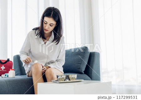 Woman Self healing perform first aid injury 117299531