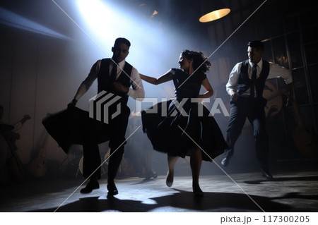 The twist - an iconic dance phenomenon originating in the late 1950s, defined by dynamic leg and body motions, spins, and jumps, set to the beat of rock and roll or rhythm and blues music The twist - an iconic dance phenomenon originating in the late 1950s, defined by dynamic leg and body motions, spins, and jumps, set to the beat of rock and roll or rhythm and blues music 117300205