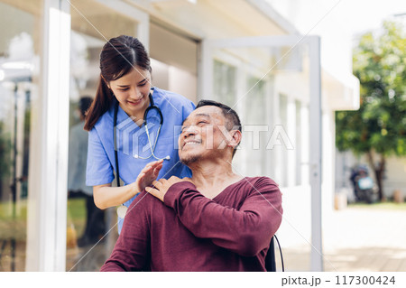 Caregiver nurse take care a Senior patient outside home. Nurse helping senior people Caregiver nurse take care a Senior patient outside home. Nurse helping senior people 117300424