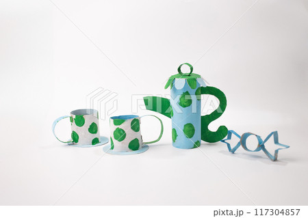 paper tea pair craft, grey background 117304857