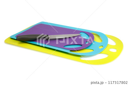 plastic kitchen cutting board with knife isolated on the white plastic kitchen cutting board with knife isolated on the white 117317802