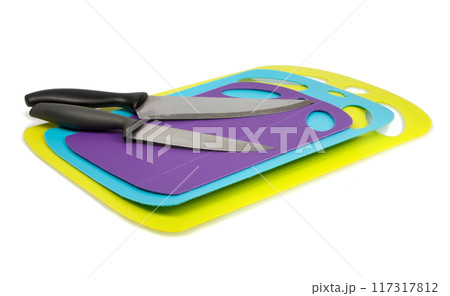 plastic kitchen cutting board with knife isolated on the white plastic kitchen cutting board with knife isolated on the white 117317812