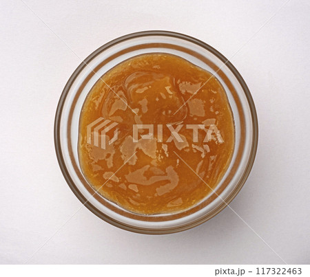 Fruit jam in glass bowl isolated on white background, top view 117322463