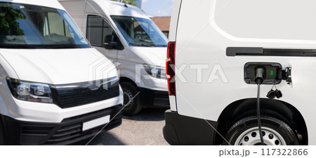 Electric delivery van with connected charging cable 117322866