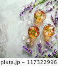 Lavender lemonade with ice cube on concrete backgrounds 117322996