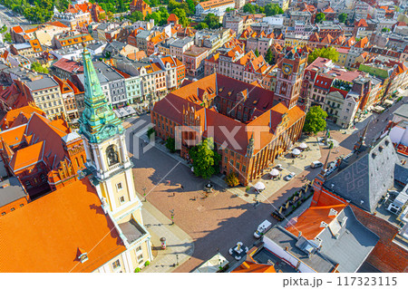 Aerial panoramic view of historical buildings and roofs in Polish medieval town Torun Aerial panoramic view of historical buildings and roofs in Polish medieval town Torun 117323115