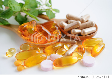 Alternative medicine herbal organic capsule with vitamin E omega 3 fish oil, mineral, drug with herbs leaf natural supplements for healthy good life. 117323171
