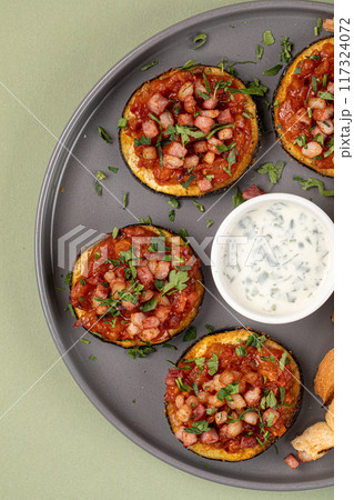 Eggplant appetizer with tomatoes and toast Eggplant appetizer with tomatoes and toast 117324072