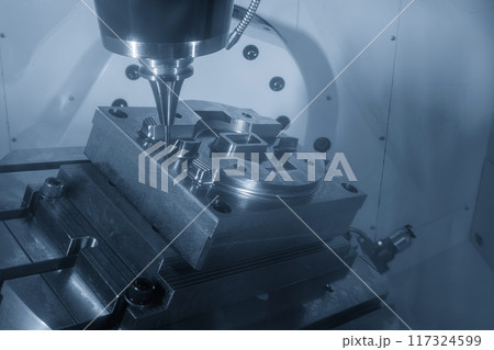 The 5-axis CNC milling machine  cutting the mold part with solid ball nose end mill tool in the light blue scene. 117324599