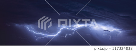 Bright Lightning On Night Sky During Hunderstorm 117324838