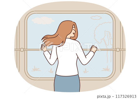 Smiling woman enjoy nature view from train window 117326913