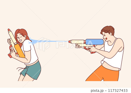 Water gun game for cheerful boy and girl enjoying being doused with water on hot summer day 117327433