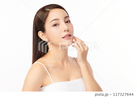 Beautiful young asian woman with clean fresh skin on white background, Face care, Facial treatment, Cosmetology, beauty and spa, Asian women portrait. Beautiful young asian woman with clean fresh skin on white background, Face care, Facial treatment, Cosmetology, beauty and spa, Asian women portrait. 117327644