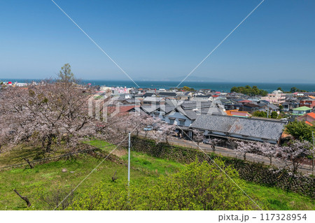 Aerial Shimabara cityscape view of city and sea with spring cherry tree Aerial Shimabara cityscape view of city and sea with spring cherry tree 117328954