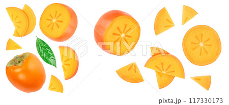 persimmon slice with leaves isolated on white background with copy space for your text. Top view. Flat lay pattern 117330173