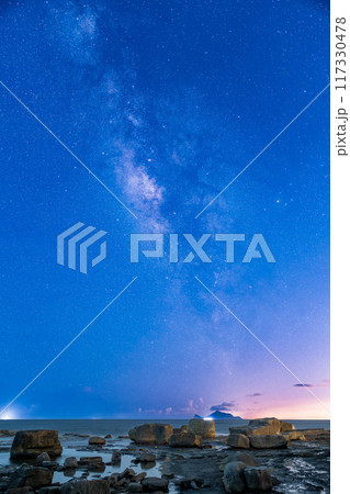 Romantic Night Sky Over Turtle Island with Galaxy and Lightning. 117330478
