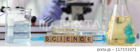 Word science collected with wooden cubes on laboratory table Word science collected with wooden cubes on laboratory table 117331071