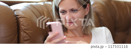 Young woman surfing internet and searching information 117331118