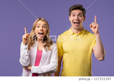 Breakthrough creative idea, couple woman man, eureka moment, pointing fingers up Breakthrough creative idea, couple woman man, eureka moment, pointing fingers up 117331397